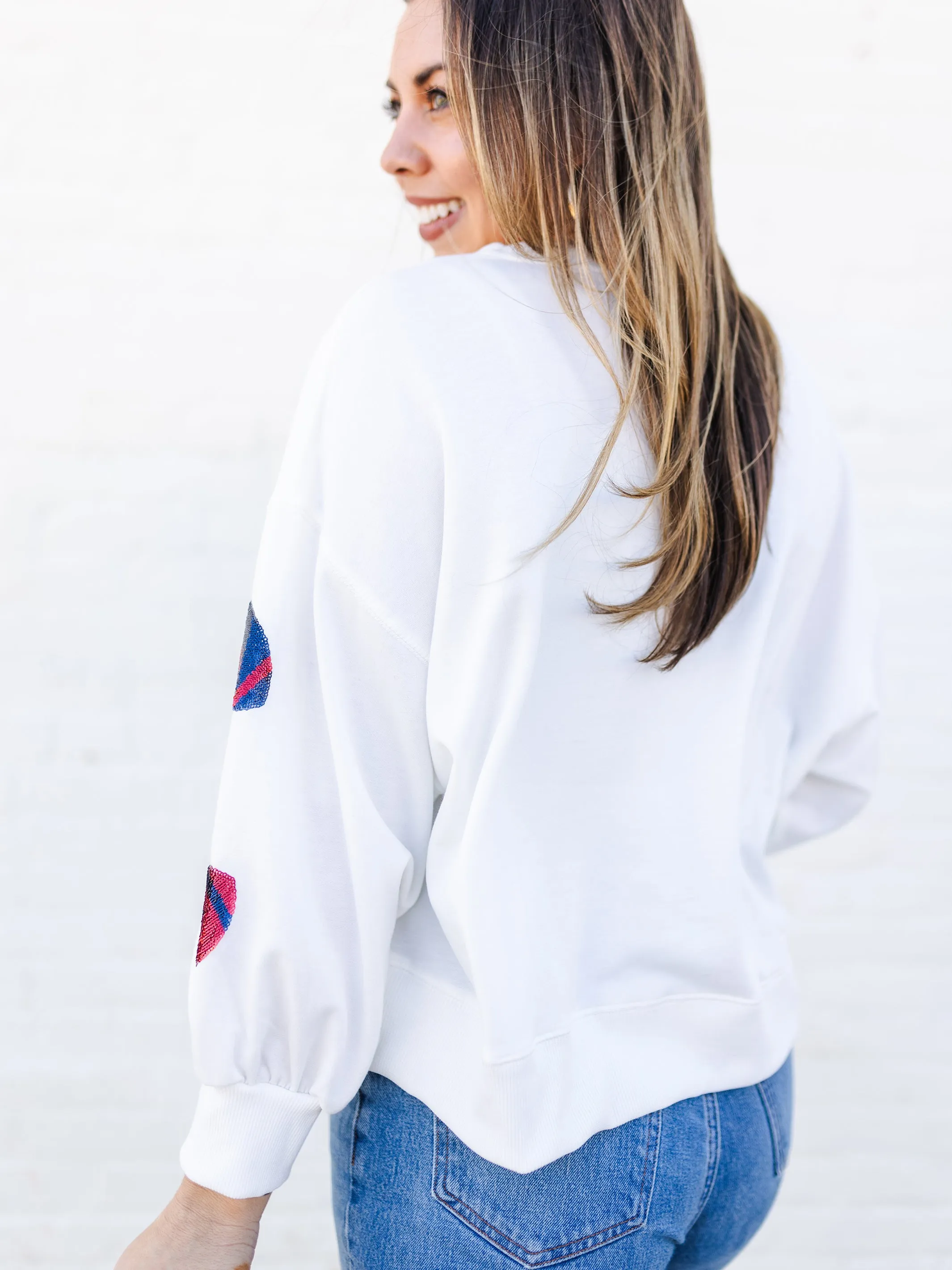 Millie Sweatshirt | Footballs Red   Blue