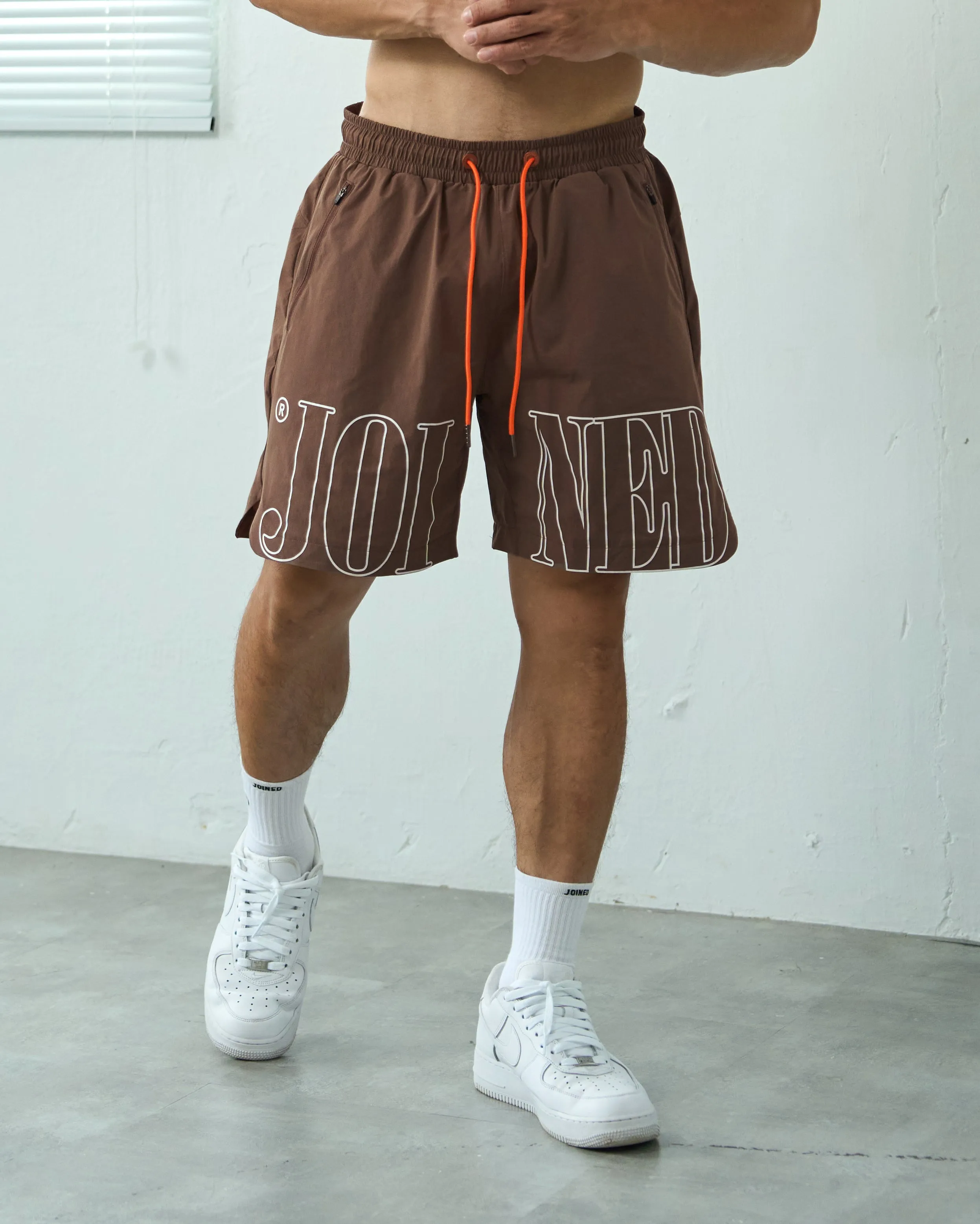 Quad Logo Side Slit Stretch Shorts