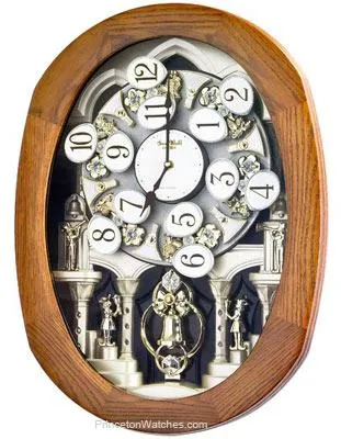 Rhythm Joyful Encore Magic Motion Wall Clock with 18 Melodies - Oak Wood Case